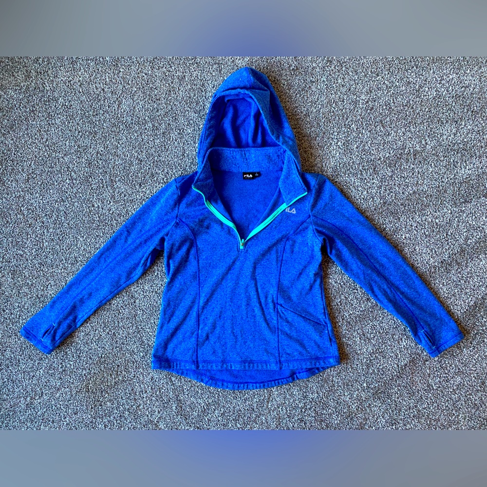 FILA sweatshirt. Size Large. Fluorescent blue with light teal color.